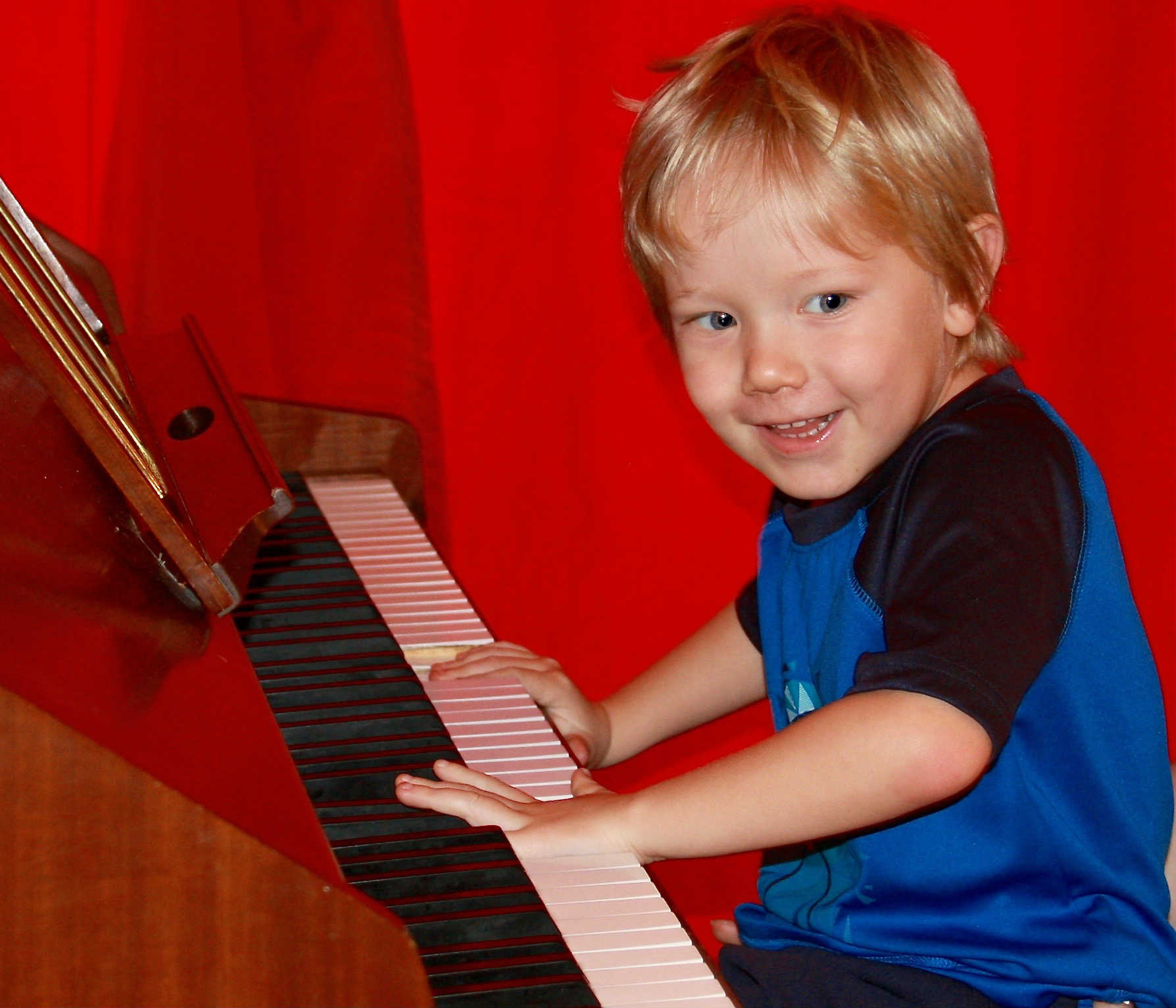 Preschool Student Playing Piano